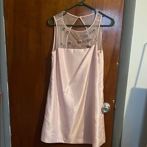 Elegant Pink Sleeveless Dress with Embellished Neckline
